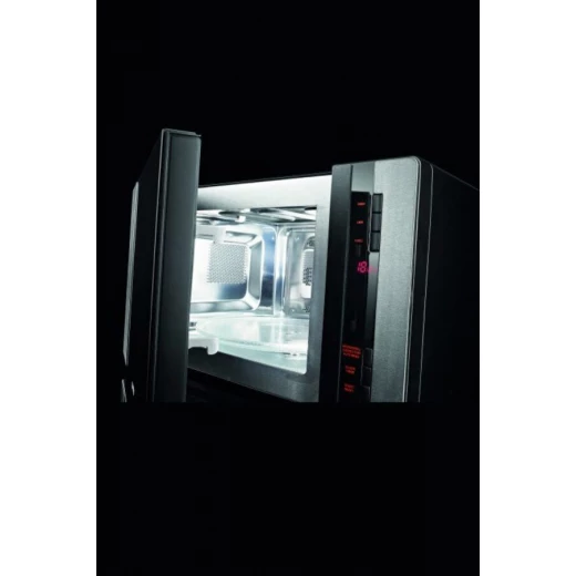 فرن ميكروويف مدمج من الستانلس ستيل من Gorenje مع شواية، سعة 30 لتر، عرض 60 سم. جهاز مطبخ متكامل للطهي السهل. يتميز بوظائف الميكروويف والشواء وتسخين فعال للمطابخ الحديثة. - جورينيه - Image 4