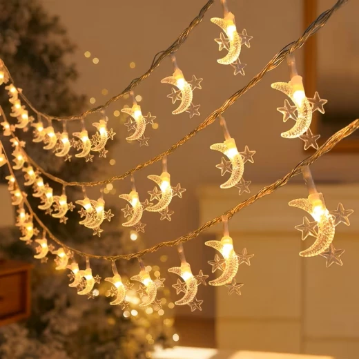 أضواء سلسلة على شكل أقمار ونجوم - تعمل بالبطارية، مصباح LED،4.5متر سم، وظيفة تشغيل/إيقاف، مثالية لغرف النوم، وغرف الأطفال، وحفلات الزفاف، والديكور الداخلي أضواء سلسلة على شكل أقمار ونجوم - تعمل بالبطارية، مصباح LED،4.5متر سم، وظيفة تشغيل/إيقاف، مثالية لغرف النوم، وغرف الأطفال، وحفلات الزفاف، والديكور الداخلي