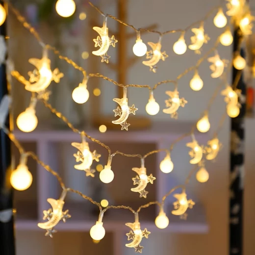 أضواء سلسلة LED على شكل أقمار ونجوم - تعمل بالبطارية، 20 مصباح LED، 300 سم، وظيفة تشغيل/إيقاف أضواء سلسلة LED على شكل أقمار ونجوم - تعمل بالبطارية، 20 مصباح LED، 300 سم، وظيفة تشغيل/إيقاف