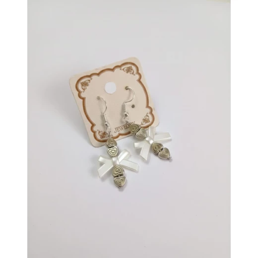 Pearly Bow & Hearts Earrings – Sophisticated Pearlescent Jewelry for an Elegant and Feminine Look Pearly Bow & Hearts Earrings – Sophisticated Pearlescent Jewelry for an Elegant and Feminine Look