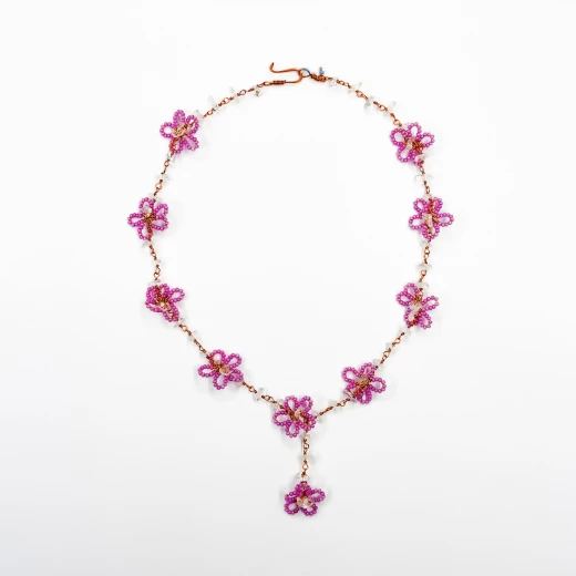 Nadia Dajani Handcrafted Beaded Necklace – Elegant Pink Floral Design with Shimmering Clear Stone Accents and Copper-Toned Wire Nadia Dajani Handcrafted Beaded Necklace – Elegant Pink Floral Design with Shimmering Clear Stone Accents and Copper-Toned Wire