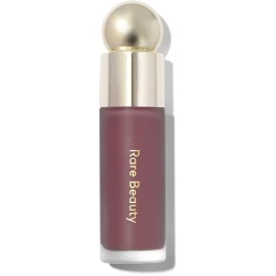 رير بيوتي Soft Liquid Blush – درجة Believe، بلاشر سائل خفيف بلمسة مطفية ناعمة، تركيبة سهلة الدمج وطويلة الثبات تمنح الخدود مظهراً طبيعياً وصحياً