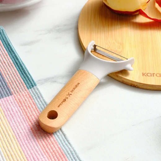 كاراجا إكس رفيقة مقشرة جانبية بمقبض خشبي، أداة تقشير خضار وفواكه عملية ومتينة بتصميم أنيق للاستخدام اليومي في المطبخ - كراجا - Image 5
