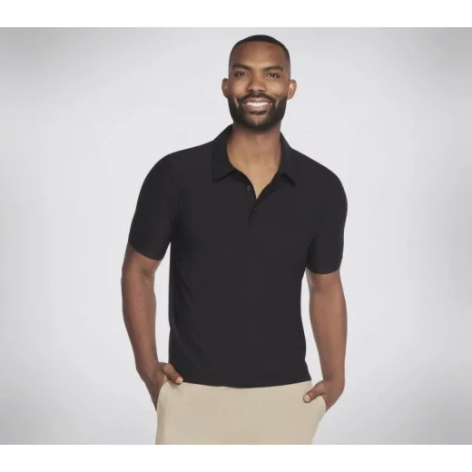 قميص بولو رجالي من سكيتشرز GO DRI® All Day Solid باللون الأسود. يتميز بنسيج جيرسي ناعم وخفيف الوزن، وأكمام قصيرة، وياقة قائمة ذاتيًا، وفتحة بأزرار 3. المقاس S. - سكيتشرز - Image 2