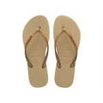 شبشب Havaianas Slim Glitter II نسائي باللون البيج والذهبي المعدني، مقاس 35/36 برازيلي، بتصميم لامع وأشرطة أنيقة، خفيف ومريح، مثالي للصيف والشاطئ - هافياناس
