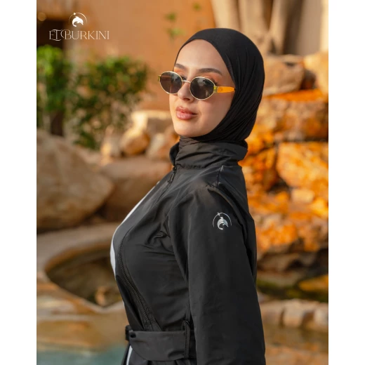 لباس سباحة بوركيني أتلانتيك كامل باللون الأسود الملكي للنساء مكون من قطعتين للحماية من الشمس وتغطية كاملة للجسم مع بنطال وسترة طويلة للسباحة المحتشمة قماش سريع الجفاف وعالي الجودة ومرن لراحة تدوم طويلا - بوركيني - Image 3