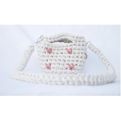 Off-white crochet bag with pink hearts in a stylish and modern design – a distinctive women's bag with a 60cm strap, suitable for everyday use and occasions, made of high-quality material with a soft touch that adds elegance to your look