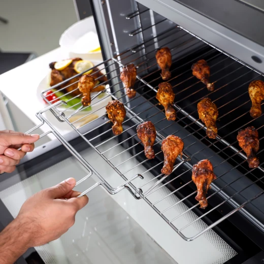 Geepas 100 L Multifunctional Oven- GO34059| 2800 W, With Rotisserie, Convection Functions and Inner Lamp| Easy to Use Control Knobs, 7 Stages Heating Selector, Adjustable Temperature| Perfect for Baking, Roasting, Cooking Meat, Vegetables, Cakes, Etc.| Bl - GEEPAS - Image 5