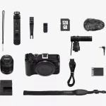 كاميرا Canon EOS R50 V مع عدسة RF-S 14-30 مم PZ، كاميرا ميرورلس مدمجة مخصصة لصناع المحتوى، تقدم تصوير عالي الجودة، فيديو وصور واضحة، عدسة واسعة بزوم، تركيز سريع، وتصميم خفيف مناسب للفلوغ والسوشيال ميديا - كانون
