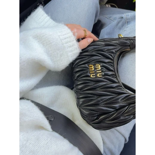 A luxurious women's handbag crafted from textured leather with a sophisticated, modern design - Master Copy stamped - AS art - Image 2