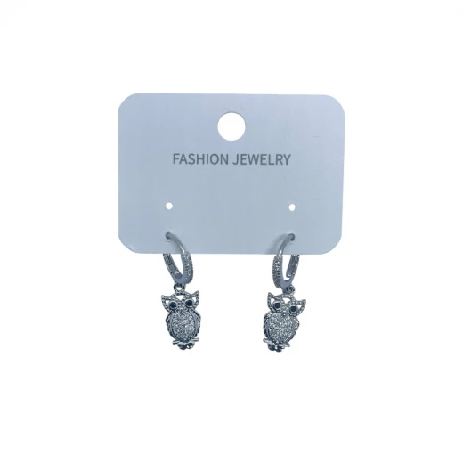 AURA Elegant silver earrings with a crystal-studded hoop and a dazzling owl charm with bold black eyes – color guaranteed. AURA Elegant silver earrings with a crystal-studded hoop and a dazzling owl charm with bold black eyes – color guaranteed.